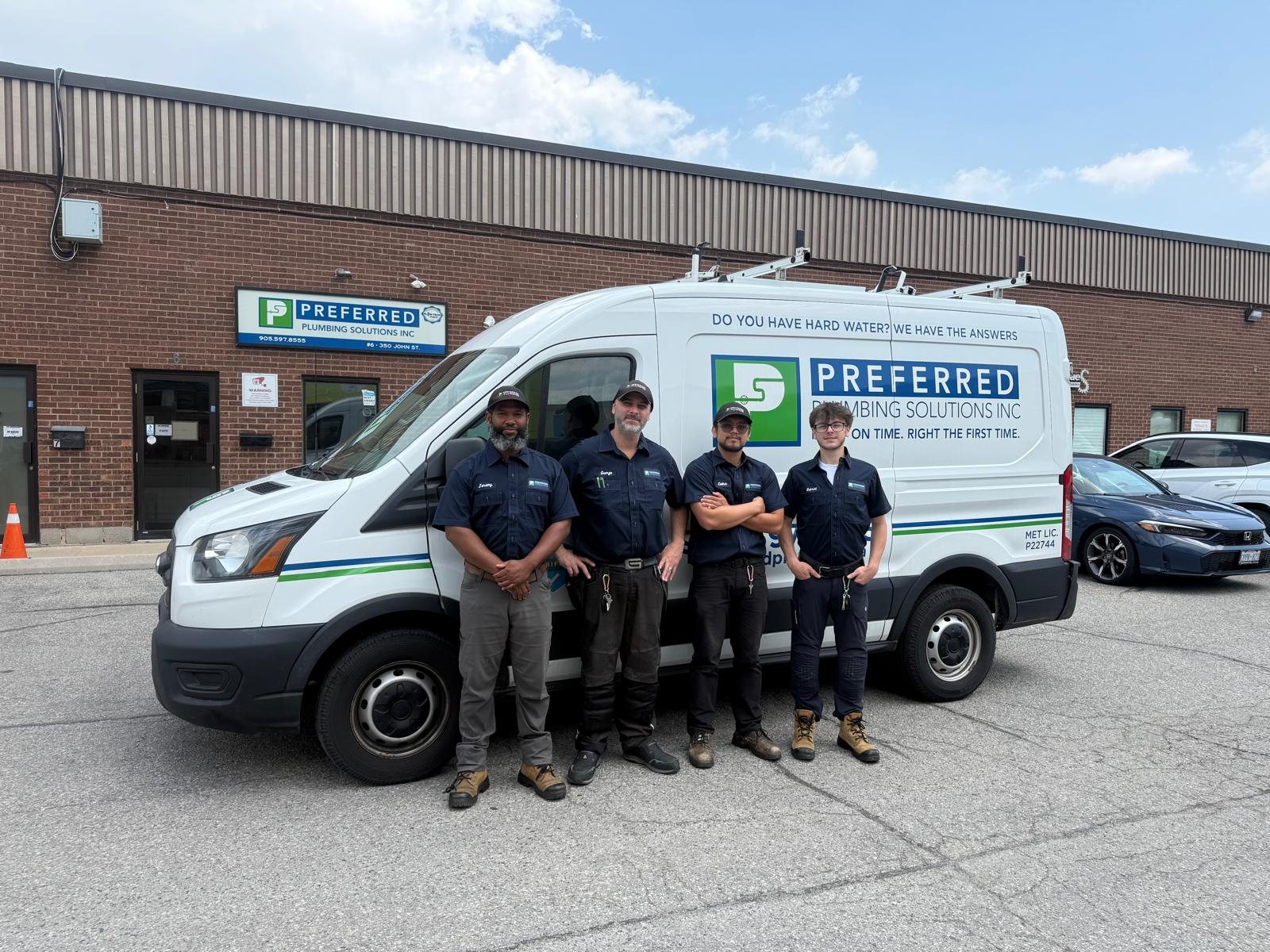 The Preferred Plumbing team with their service van